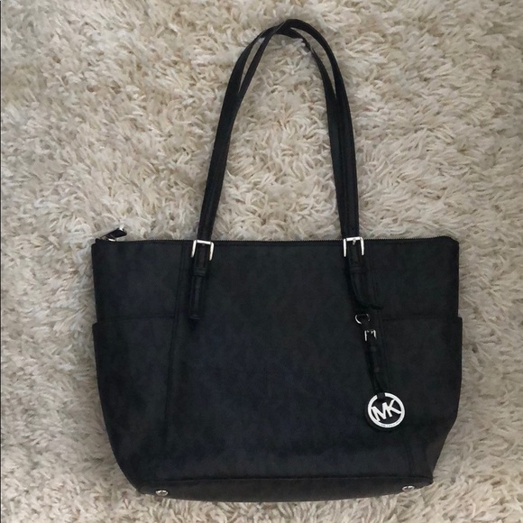Michael Kors Handbags - Authentic Michael Kors jet set bag